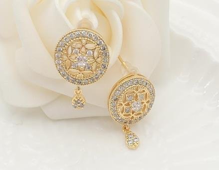 Arete Huggie Baño de Oro 18K