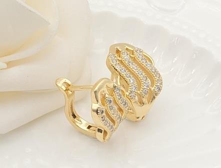 Arete Huggie Baño de Oro 18K