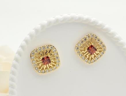 Arete Huggie Baño de Oro 18K