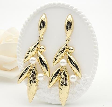 Arete Huggie Baño de Oro 18K