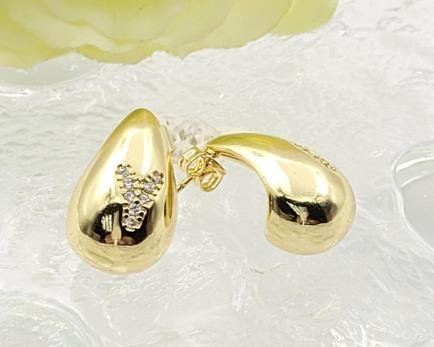 Arete Huggie Baño de Oro 18K