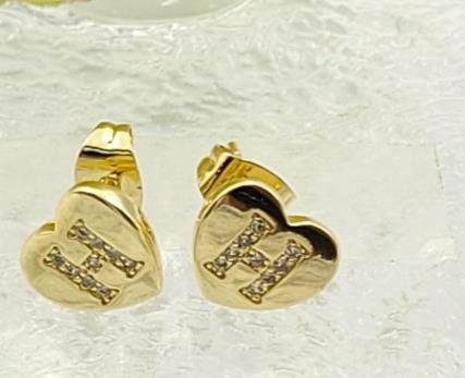 Arete Huggie Baño de Oro 18K