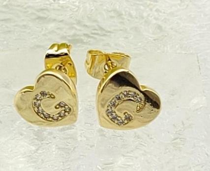 Arete Huggie Baño de Oro 18K
