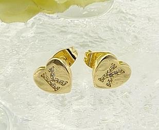 Arete Huggie Baño de Oro 18K