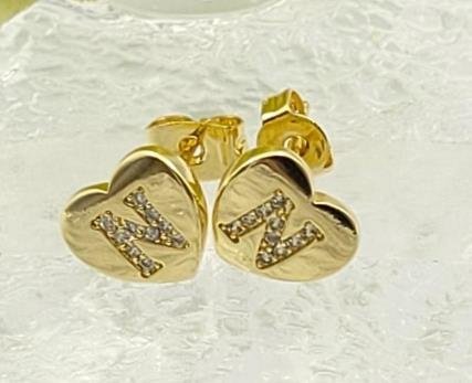 Arete Huggie Baño de Oro 18K