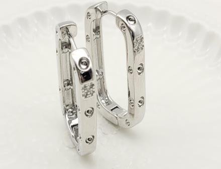 Arete Huggie Baño de Oro 18K