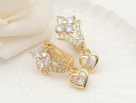 Arete Huggie Baño de Oro 18K
