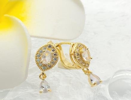 Arete Huggie Baño de Oro 18K