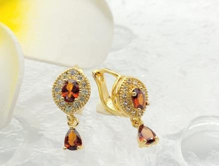 Arete Huggie Baño de Oro 18K