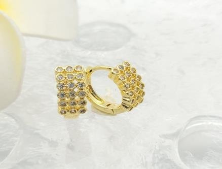 Arete Huggie Baño de Oro 18K