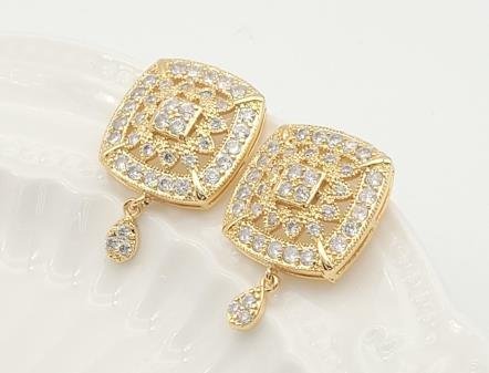Arete Huggie Baño de Oro 18K
