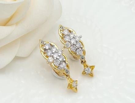 Arete Huggie Baño de Oro 18K
