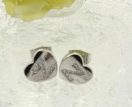 Arete Huggie Baño de Oro 18K
