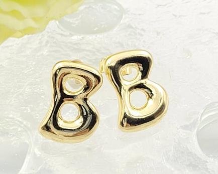 Arete Huggie Baño de Oro 18K