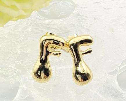 Arete Huggie Baño de Oro 18K