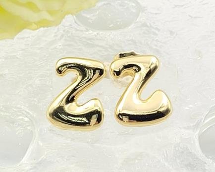 Arete Huggie Baño de Oro 18K