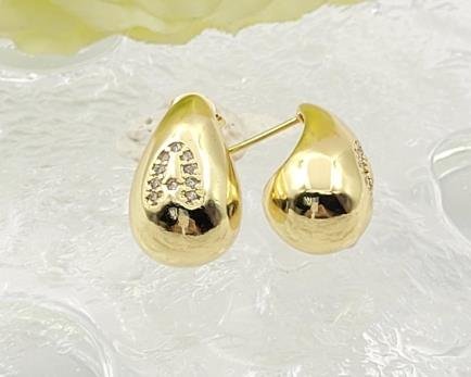 Arete Huggie Baño de Oro 18K