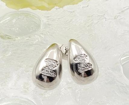 Arete Huggie Baño de Oro 18K