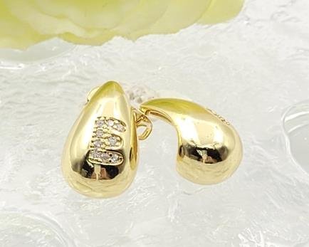 Arete Huggie Baño de Oro 18K