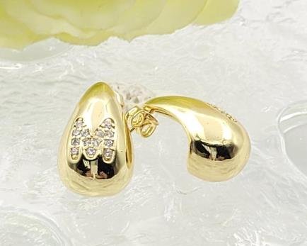Arete Huggie Baño de Oro 18K