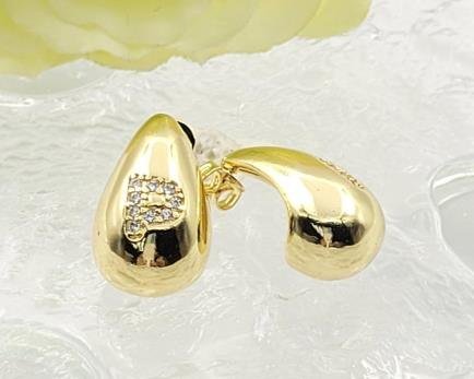 Arete Huggie Baño de Oro 18K
