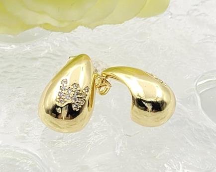 Arete Huggie Baño de Oro 18K