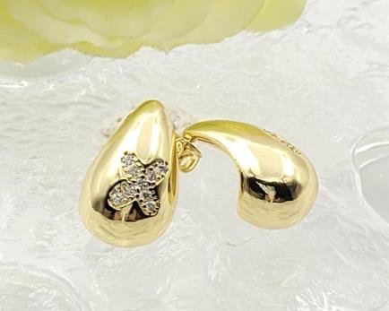 Arete Huggie Baño de Oro 18K