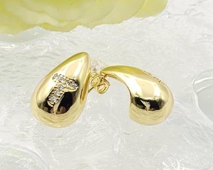 Arete Huggie Baño de Oro 18K