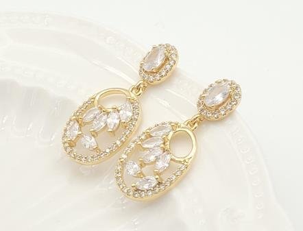 Arete Huggie Baño de Oro 18K
