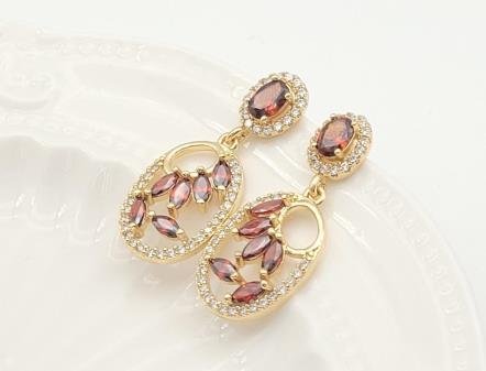 Arete Huggie Baño de Oro 18K