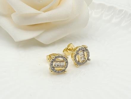 Arete Huggie Bicolor Oro y Rodio