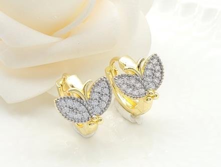 Arete Huggie Bicolor Oro y Rodio