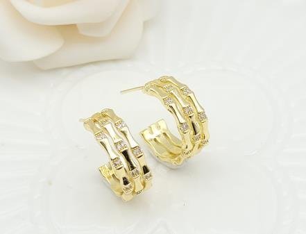 Arete Huggie Baño de Oro 18K