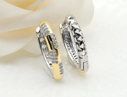 Arete Huggie Bicolor Oro y Rodio