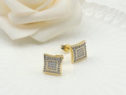 Arete Huggie Bicolor Oro y Rodio