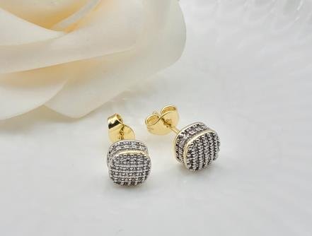Arete Huggie Bicolor Oro y Rodio
