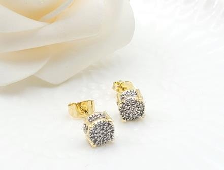Arete Huggie Bicolor Oro y Rodio
