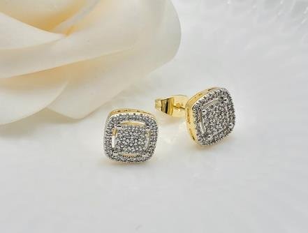 Arete Huggie Bicolor Oro y Rodio