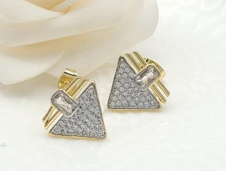 Arete Huggie Bicolor Oro y Rodio