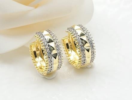 Arete Huggie Bicolor Oro y Rodio