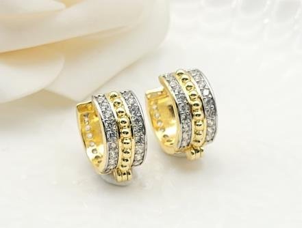 Arete Huggie Bicolor Oro y Rodio