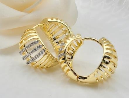 Arete Huggie Bicolor Oro y Rodio