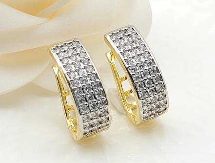 Arete Huggie Bicolor Oro y Rodio
