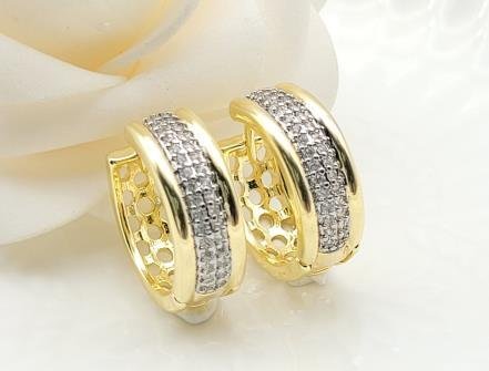 Arete Huggie Bicolor Oro y Rodio
