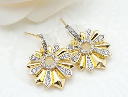 Arete Huggie Bicolor Oro y Rodio