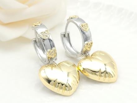 Arete Huggie Bicolor Oro y Rodio