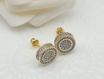 Arete Huggie Bicolor Oro y Rodio