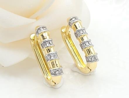 Arete Huggie Bicolor Oro y Rodio