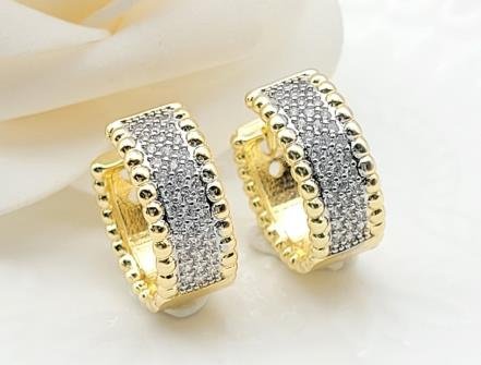 Arete Huggie Bicolor Oro y Rodio