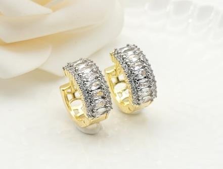 Arete Huggie Bicolor Oro y Rodio